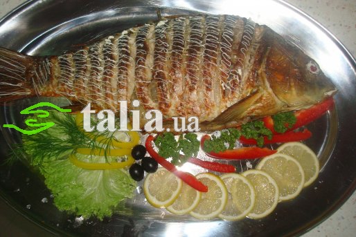 Рецепт. Запеченный карп с луком